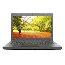 Laptop with a scenic display on a white background