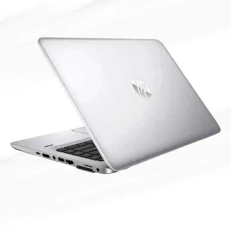 Silver HP laptop on a white background