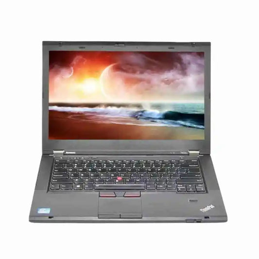 Laptop with a space-themed display on a white background