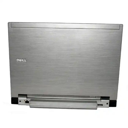 Silver Dell laptop on a white background