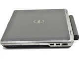 A closed silver and gray Dell laptop with a black side handle, shown from a three-quarters perspective on a white background.
