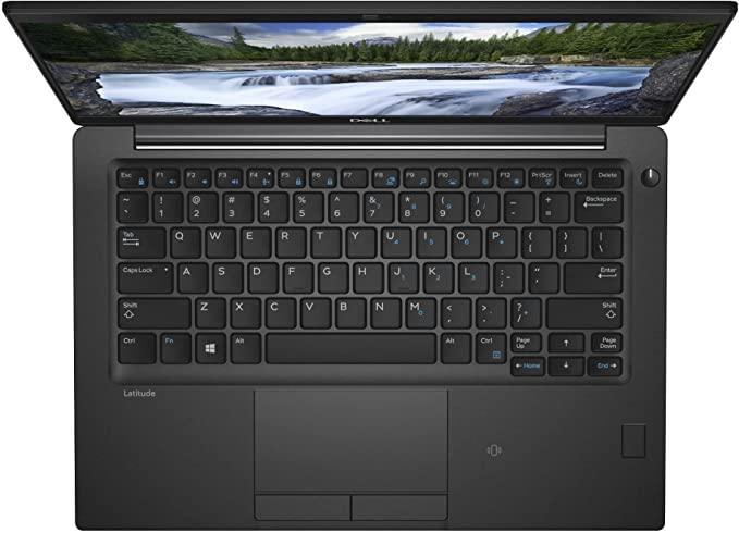 Dell Latitude 7390 business laptop keyboard close-up, showing function keys, touchpad buttons, and ergonomic design.- Rentopc