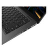 Close-up of a laptop keyboard and side view on a white background