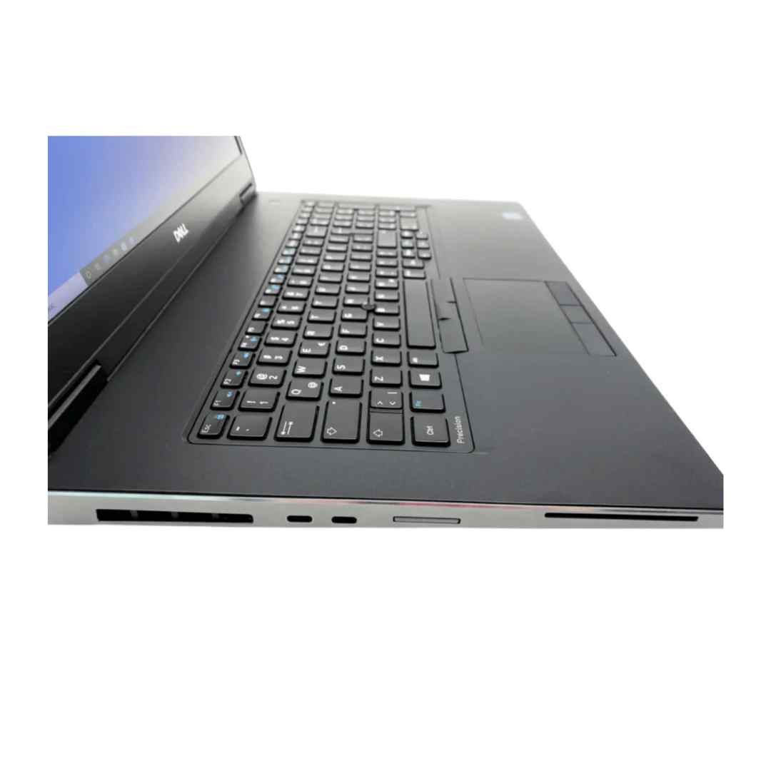 Dell Precision 7730 left angle view showing full-size keyboard, numeric keypad, touchpad with buttons, and left-side ports including SD card reader, SmartCard reader, and cooling vents.- Rentopc
