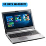 Laptop with a 30-day warranty on a white background
