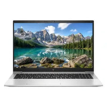 Laptop displaying a scenic mountain and lake on the screen with an HP logo.