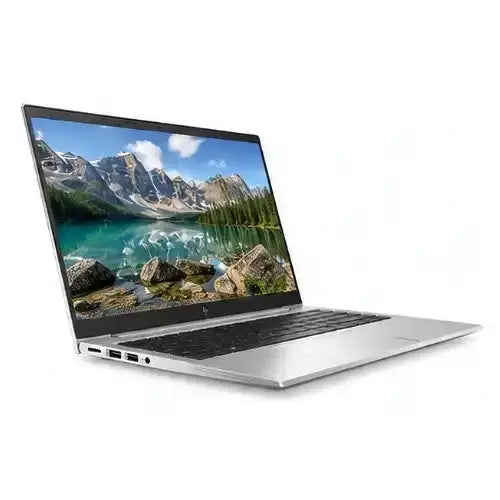 Laptop displaying a scenic mountain view on a white background