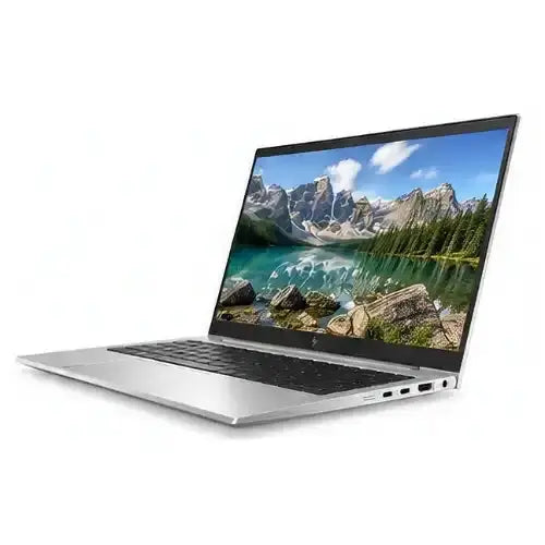 Laptop displaying a scenic mountain and lake on its screen with a white background