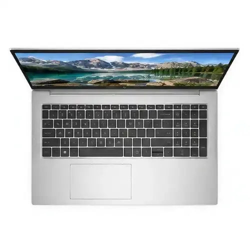 Laptop with a scenic display on a white background