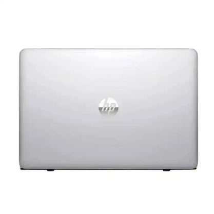Silver HP laptop on a white background