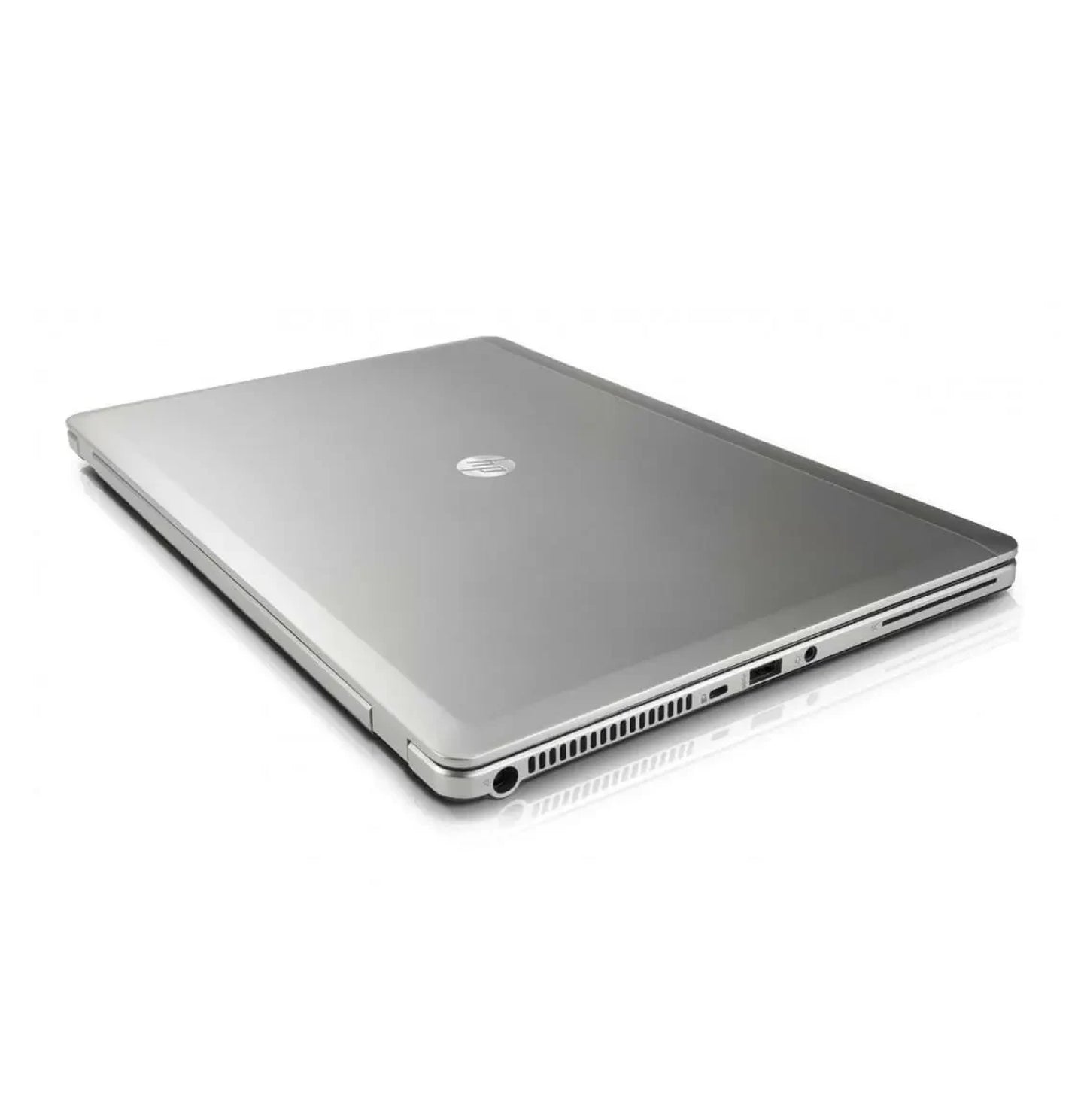 Closed angled view of HP EliteBook Folio 9470m laptop featuring sleek silver design and HP logo.- Rentopc