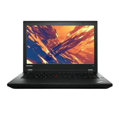 Black laptop with a scenic display on a white background