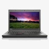 Laptop with a scenic display on a white background
