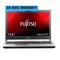 Fujitsu laptop with a 30-day warranty on a white background
